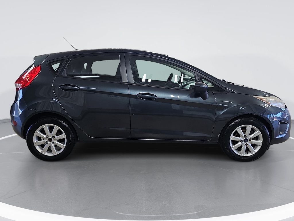 Used 2011 Ford Fiesta SE with VIN 3FADP4EJ7BM148240 for sale in Hudsonville, MI