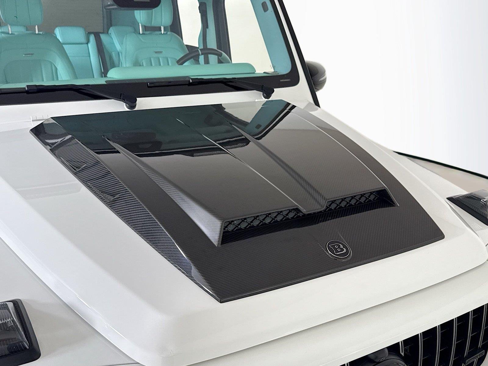 Used 2024 Polar White Mercedes-Benz AMG® G 63  Brabus Custom Widebody / Custom Tiffany Interior image 34