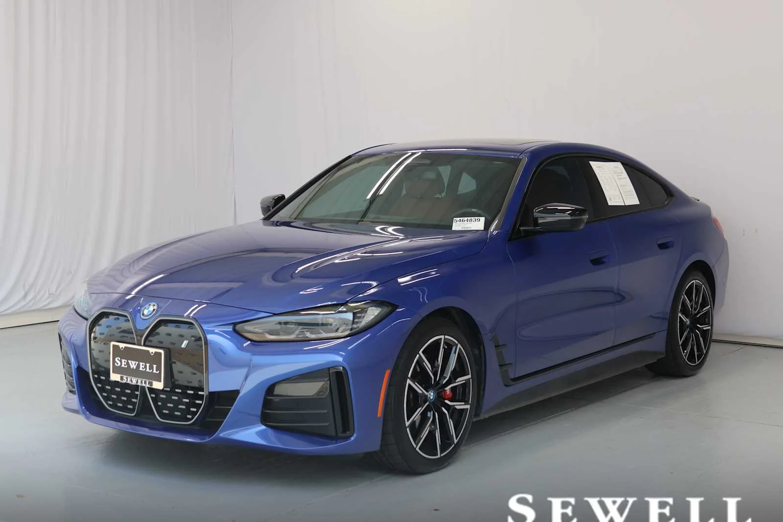 Used 2023 Portimao Blue Metallic BMW eDrive40 image 1