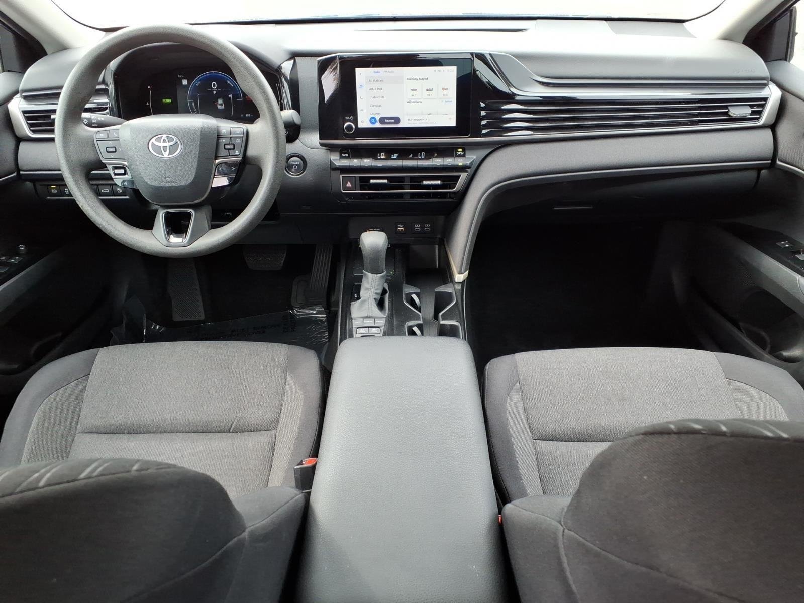 Used 2025 Reservoir Blue Toyota LE image 19