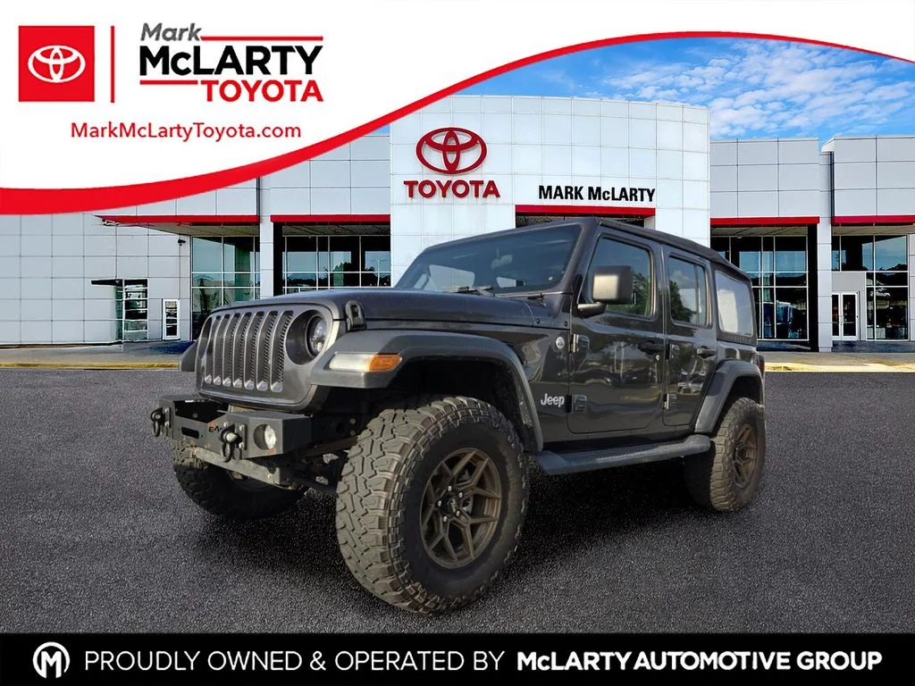 Used 2018 Gray Jeep Unlimited Sport image 1