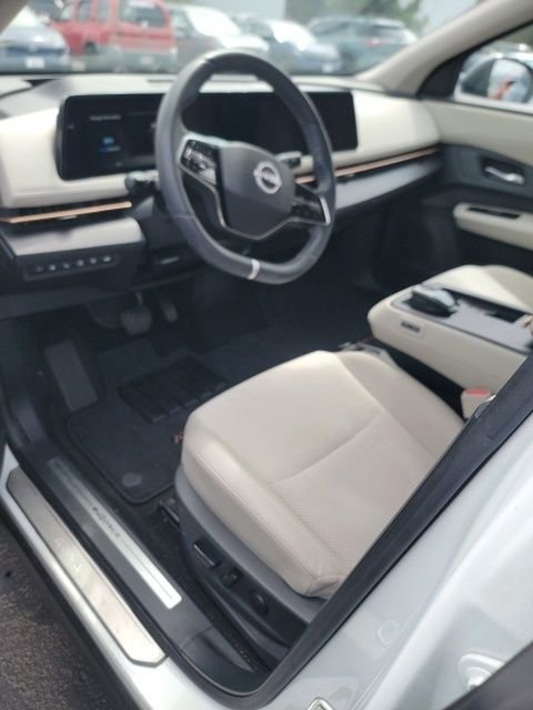 Used 2024 White Nissan EVOLVE+ e-4ORCE image 11