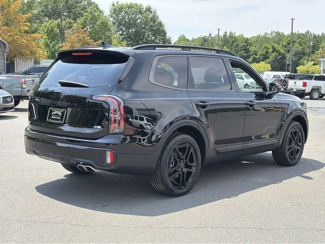 Used 2025 Black Kia EX X-Line image 13
