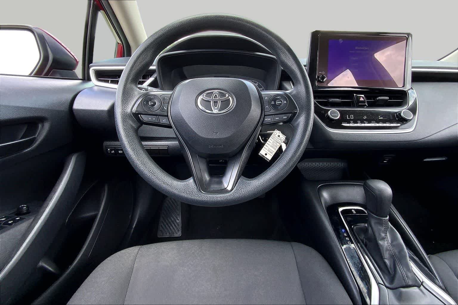 Used 2024 Ruby Flare Pearl Toyota LE image 6