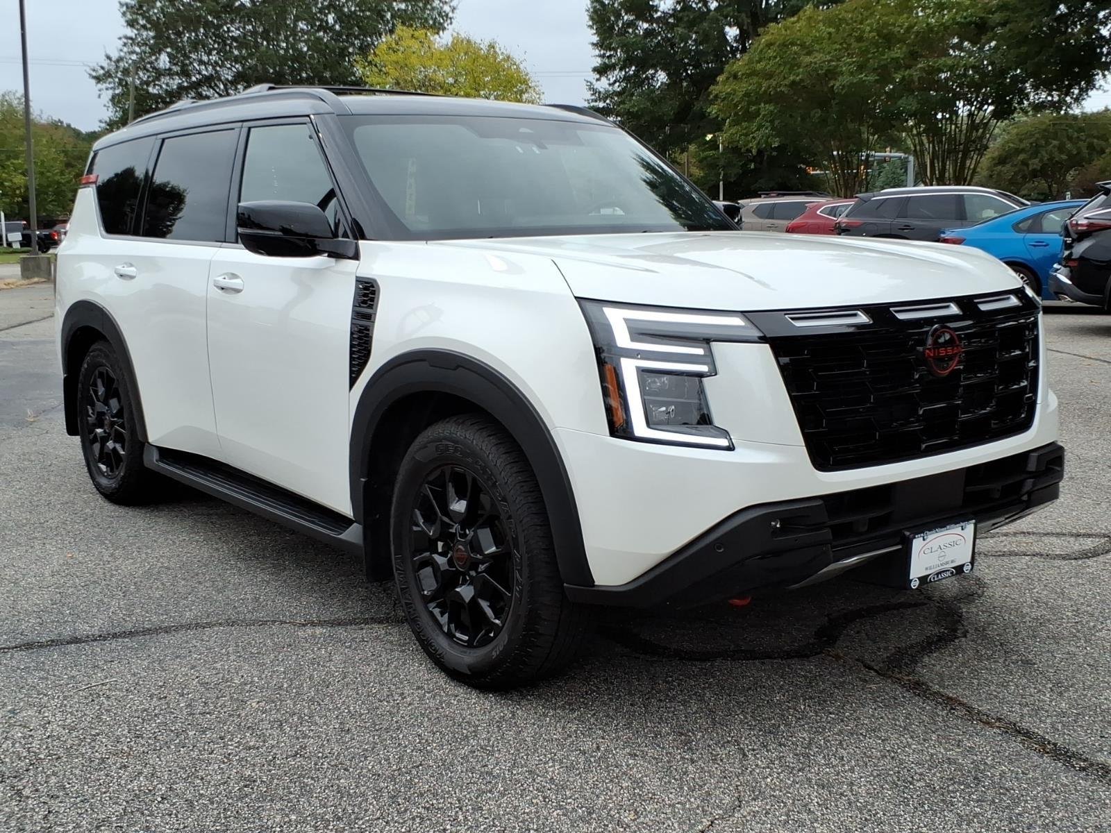 Used 2025 Aspen White Tricoat/Super Black Nissan PRO-4X image 5