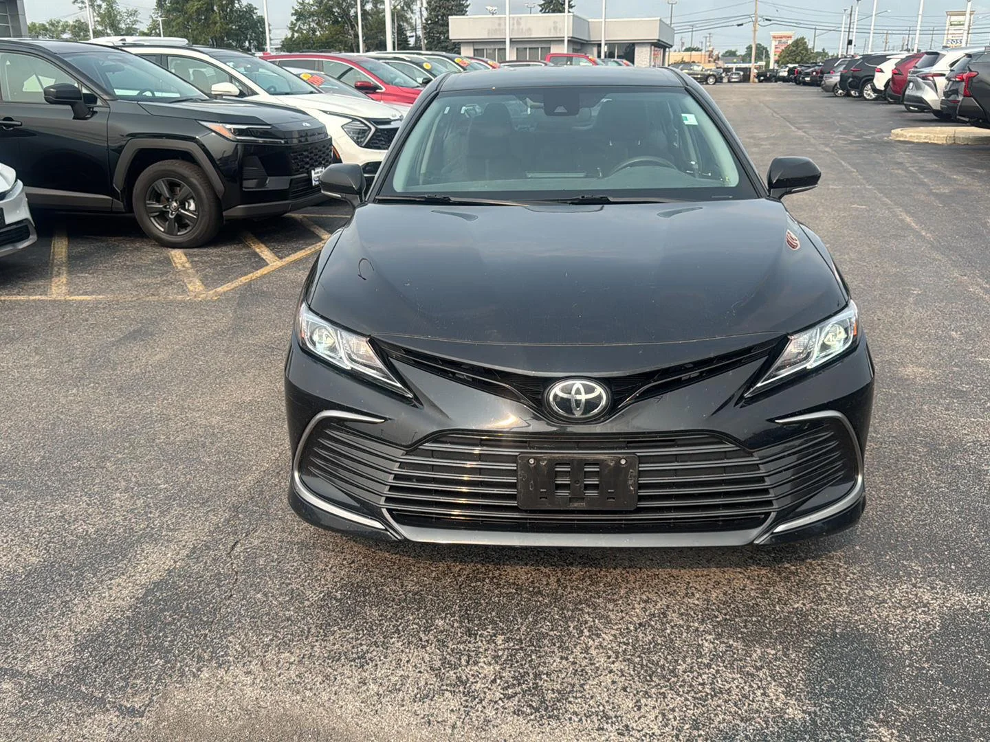 Used 2021 Midnight Black Metallic Toyota LE image 2