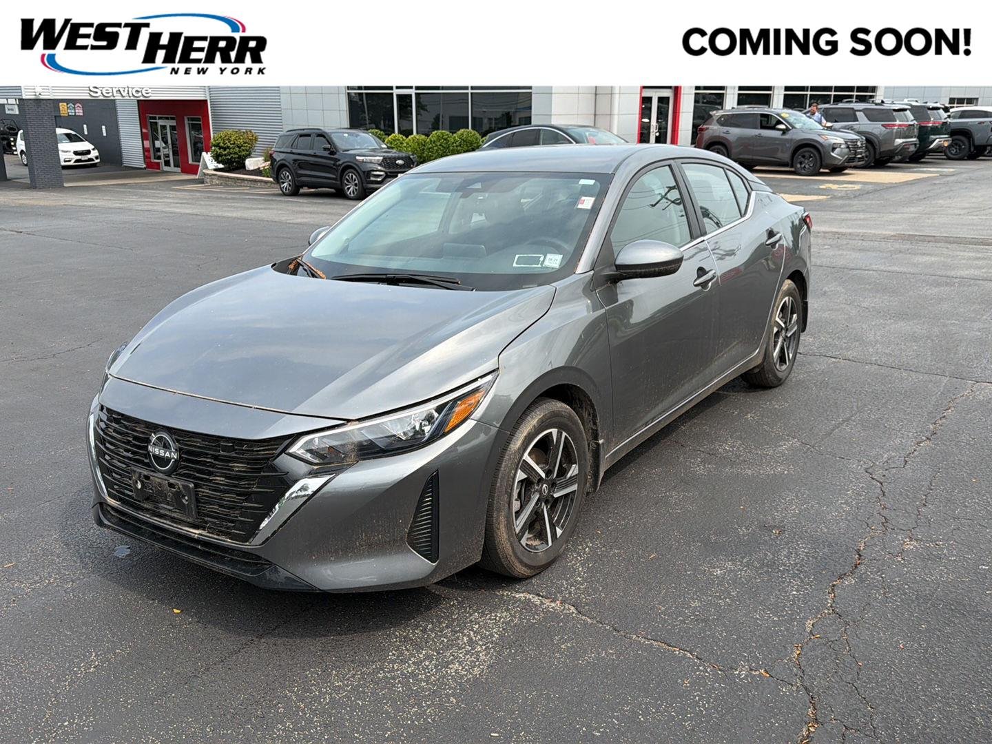 Used 2024 Gun Metallic Nissan SV image 1