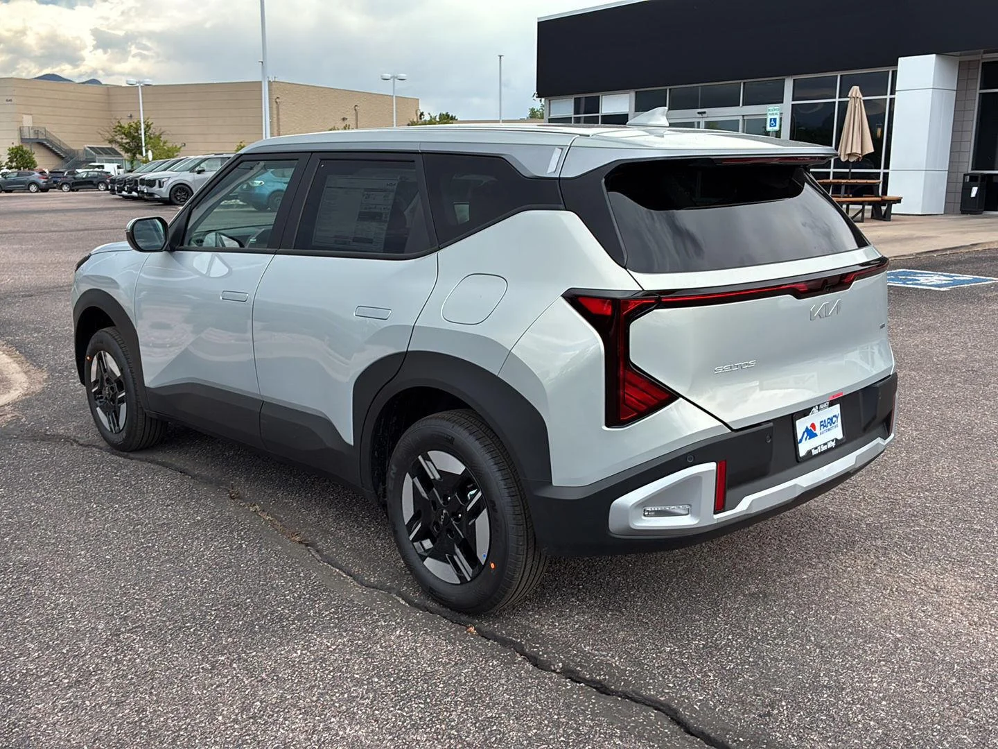 New 2027 Ivory Silver Kia LX image 6