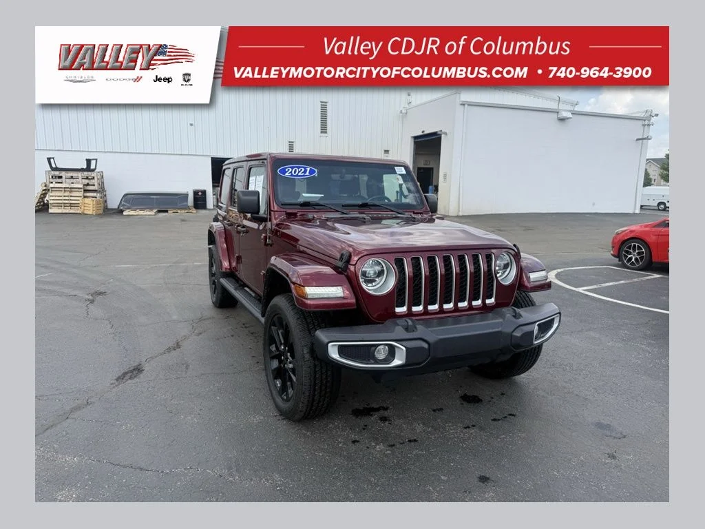 Used 2021 Red Jeep Unlimited Sahara 4xe image 1
