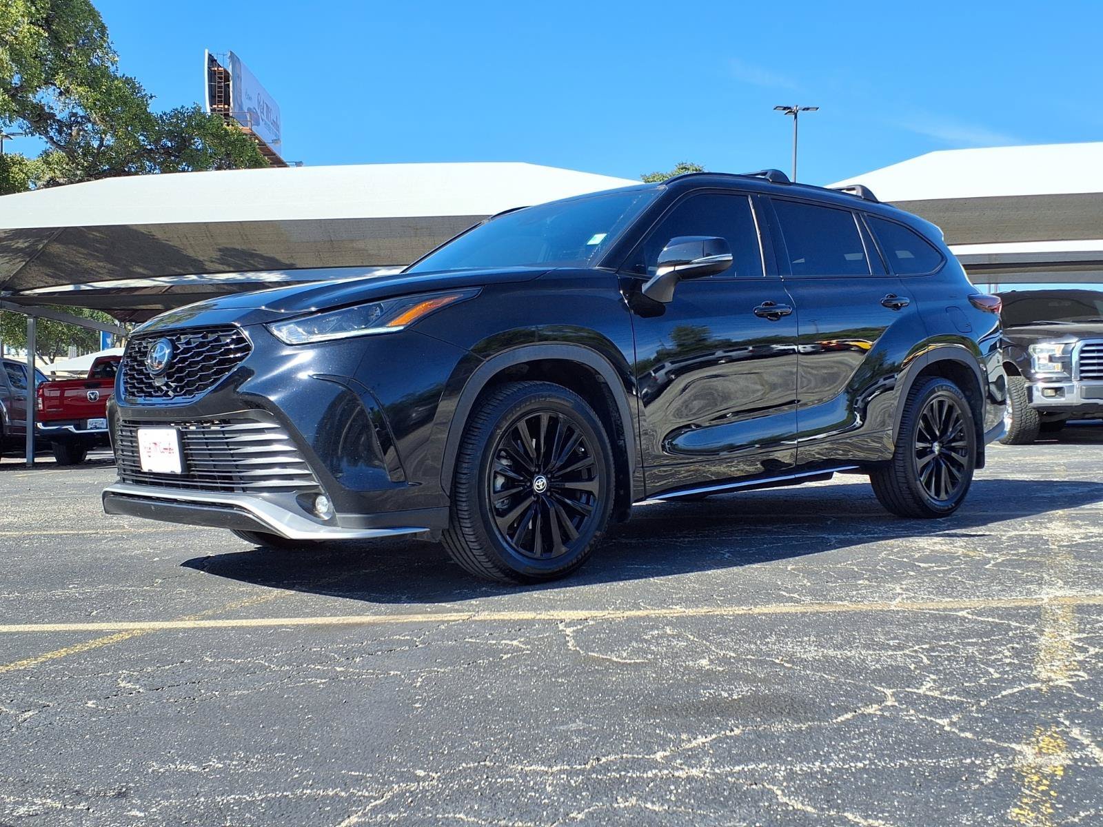Used 2024 Black Toyota LE image 1