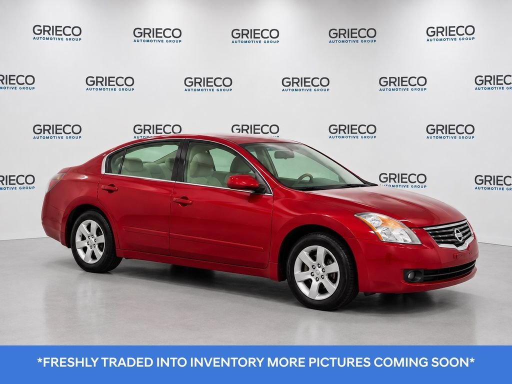 Used 2009 Red Nissan 2.5 S image 1