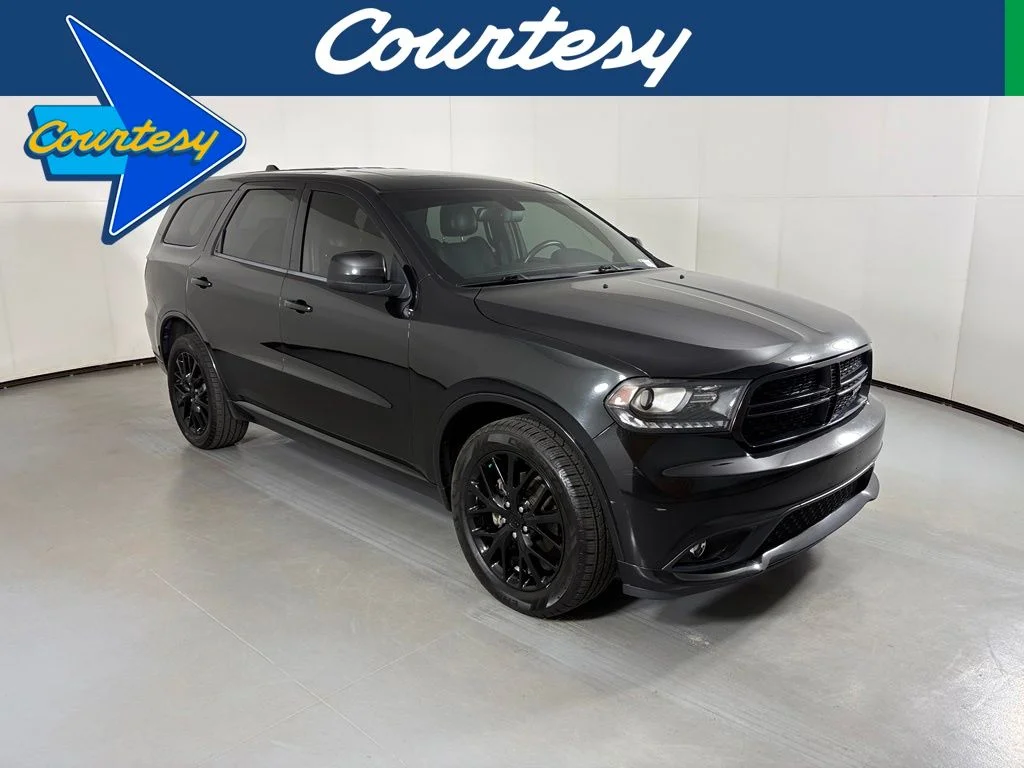 Used 2015 Black Dodge SXT image 1