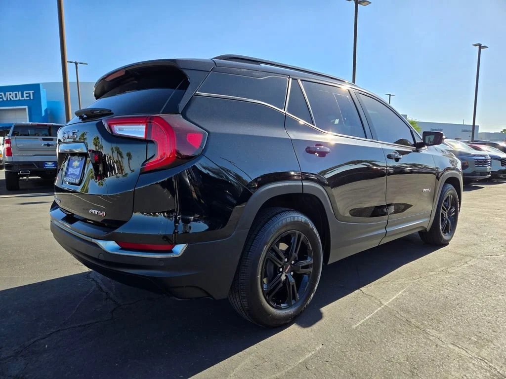 Used 2023 Ebony Twilight Metallic GMC AT4 image 6