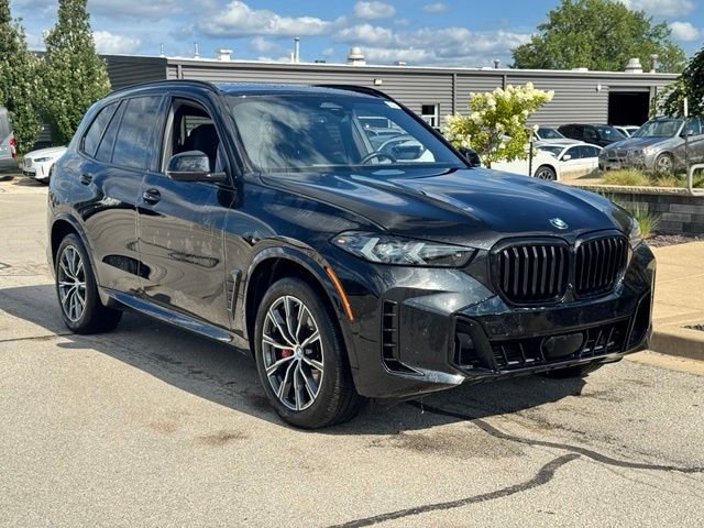 Certified Used 2024 Black Sapphire Metallic BMW xDrive40i image 2