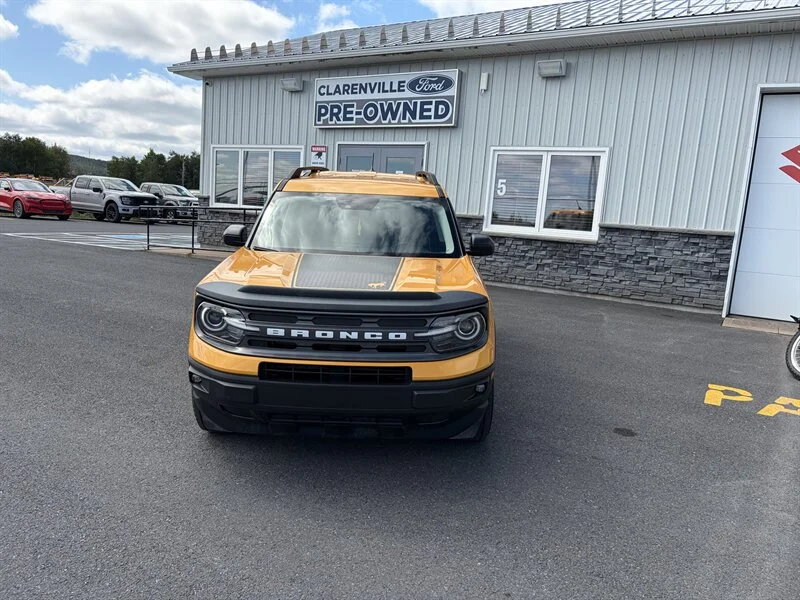 Used 2023 Orange Ford Big Bend image 1