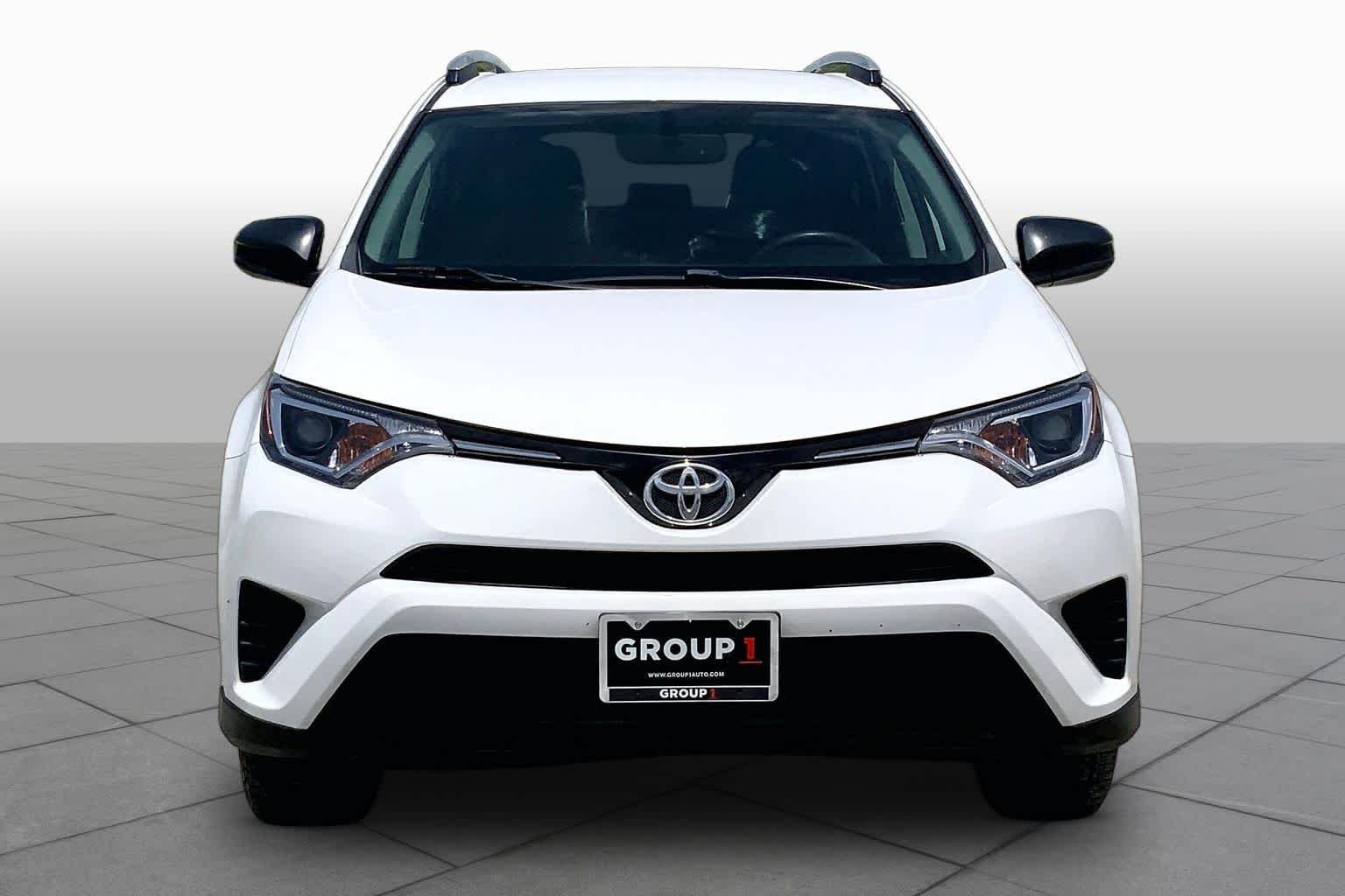Used 2016 Super White Toyota LE image 4