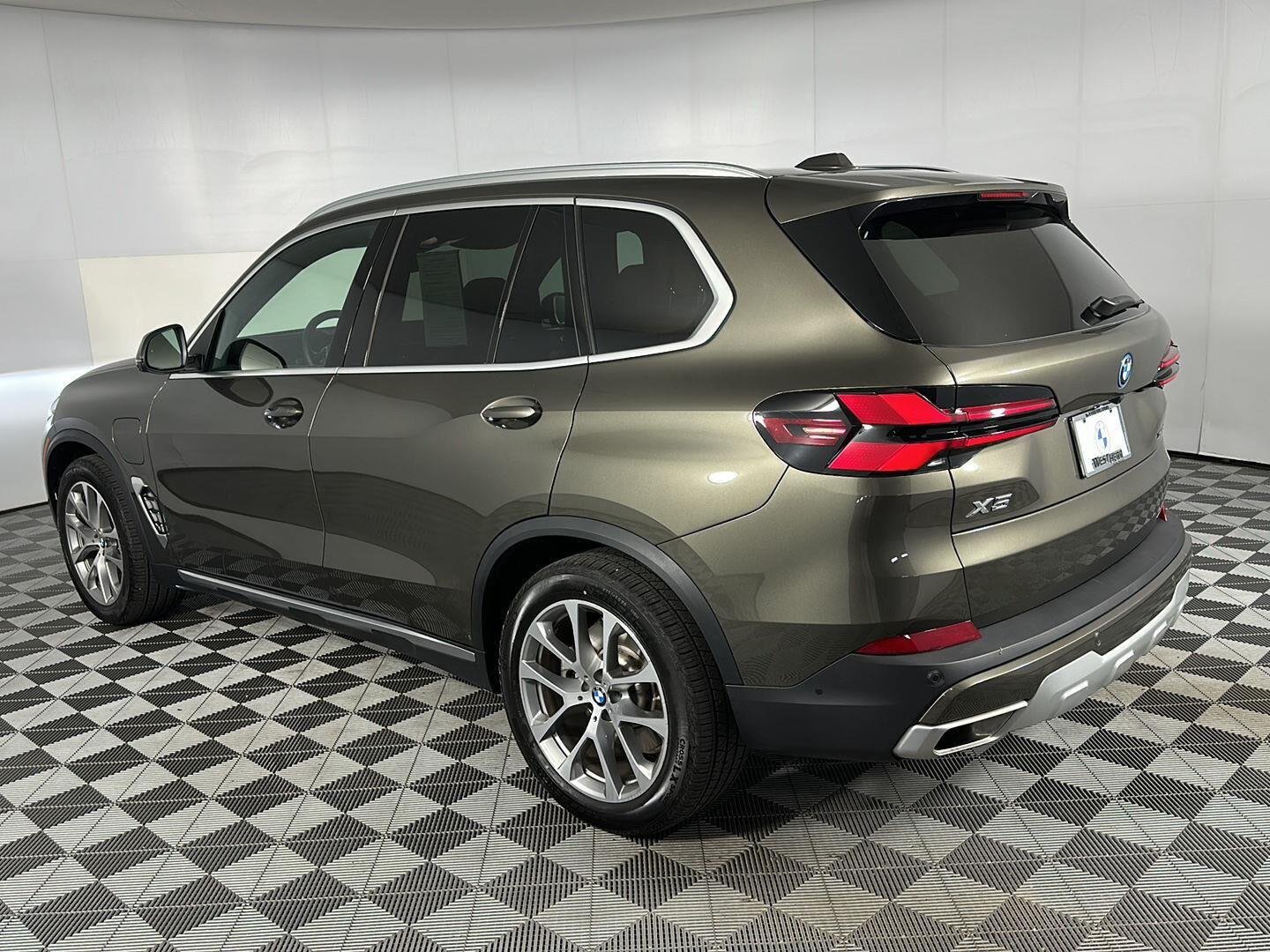 New 2026 Manhattan Green Metallic BMW xDrive50e image 8