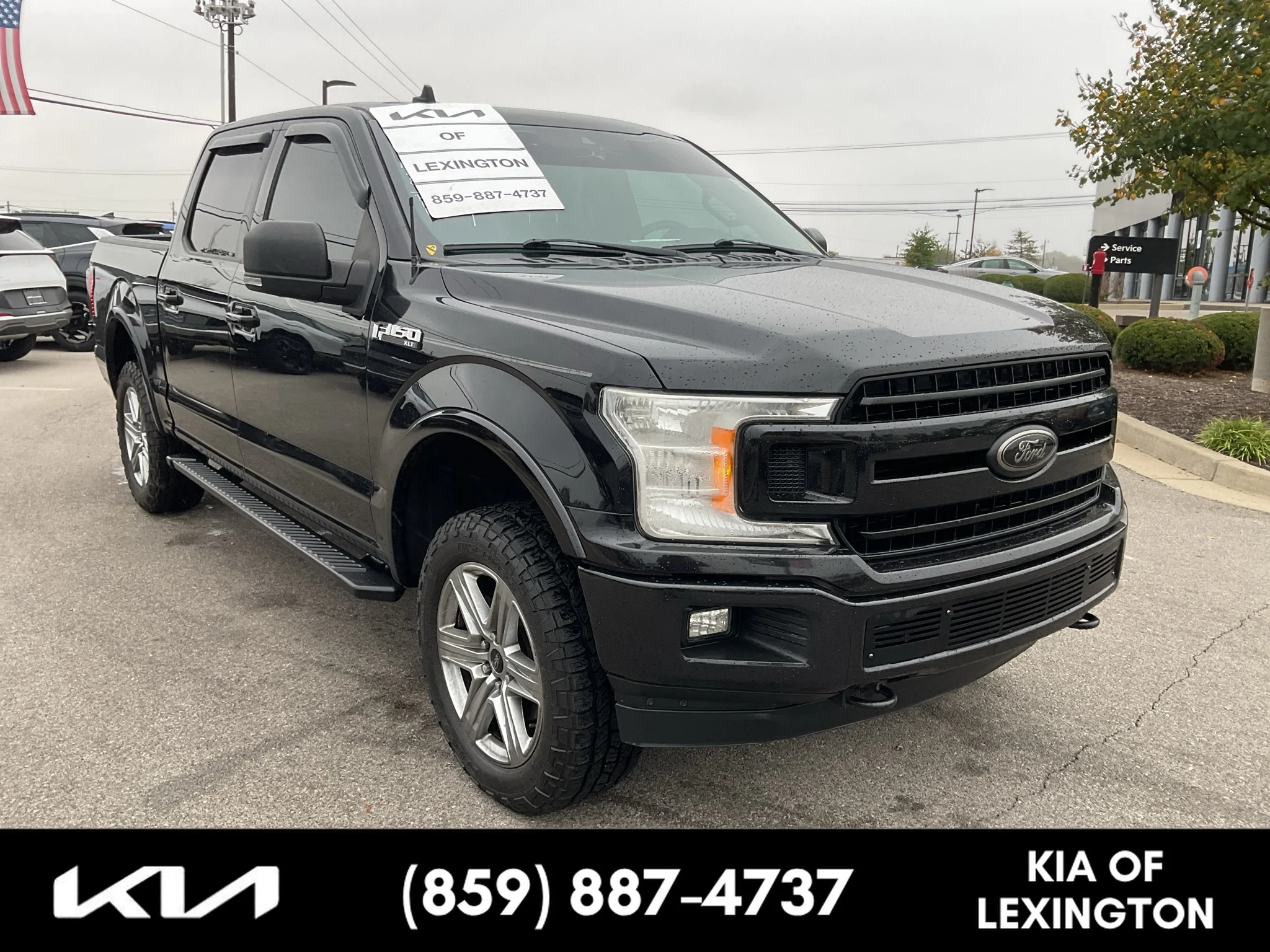 Used 2019 Agate Black Metallic Ford XLT image 1