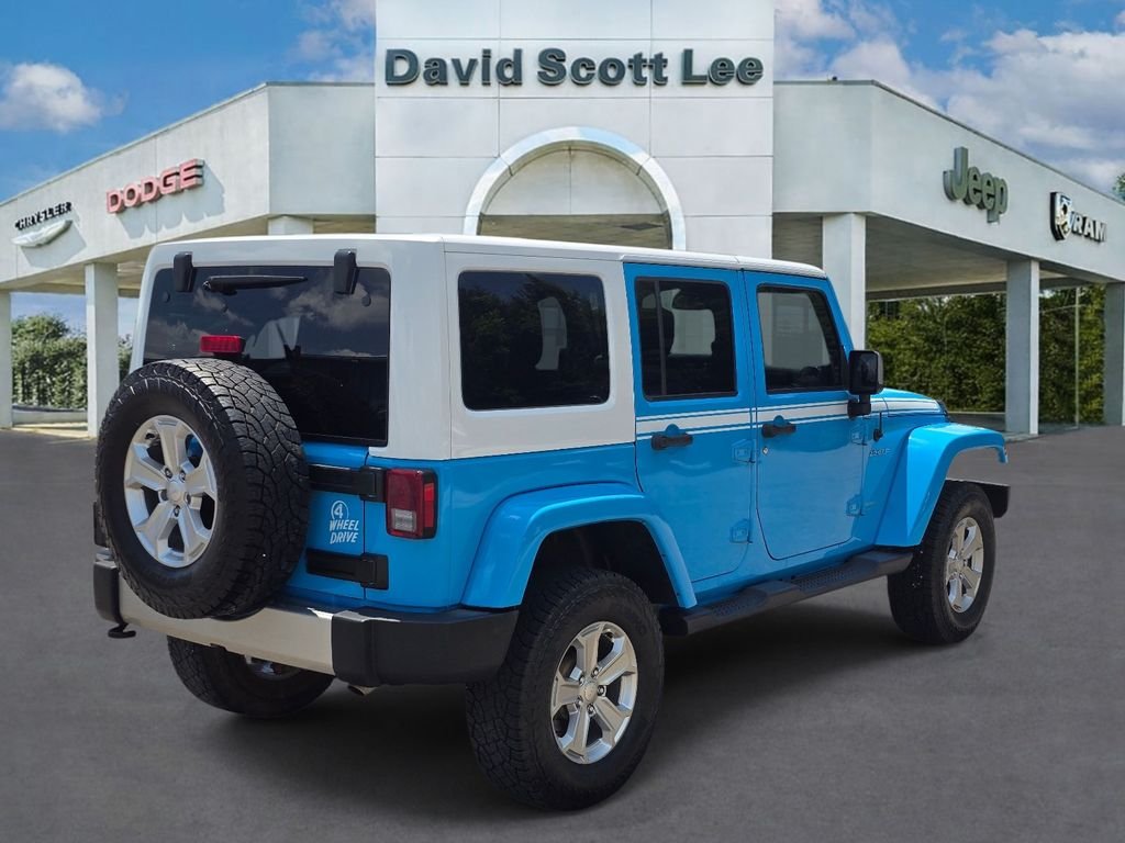 Used 2017 Blue Jeep Unlimited Sahara image 6