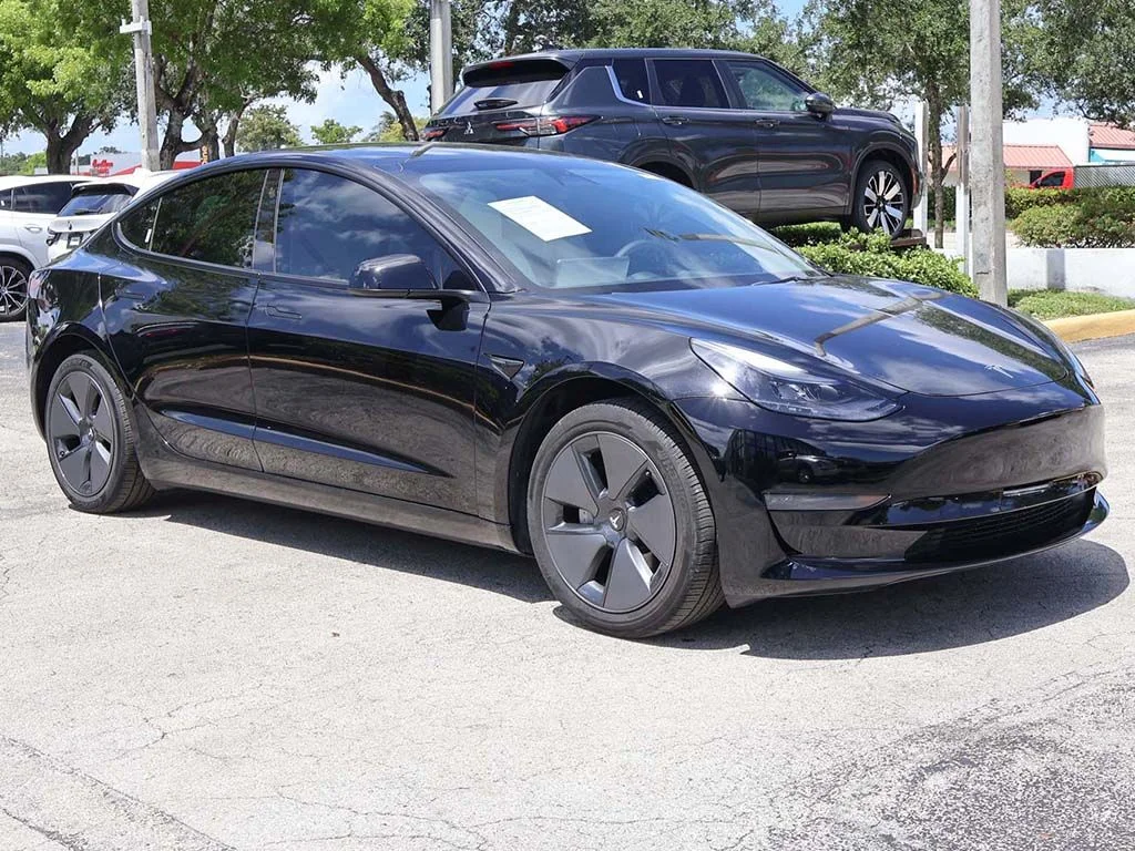 Used 2023 Tesla Model 3 Base with VIN 5YJ3E1EA2PF567053 for sale in Miami, FL