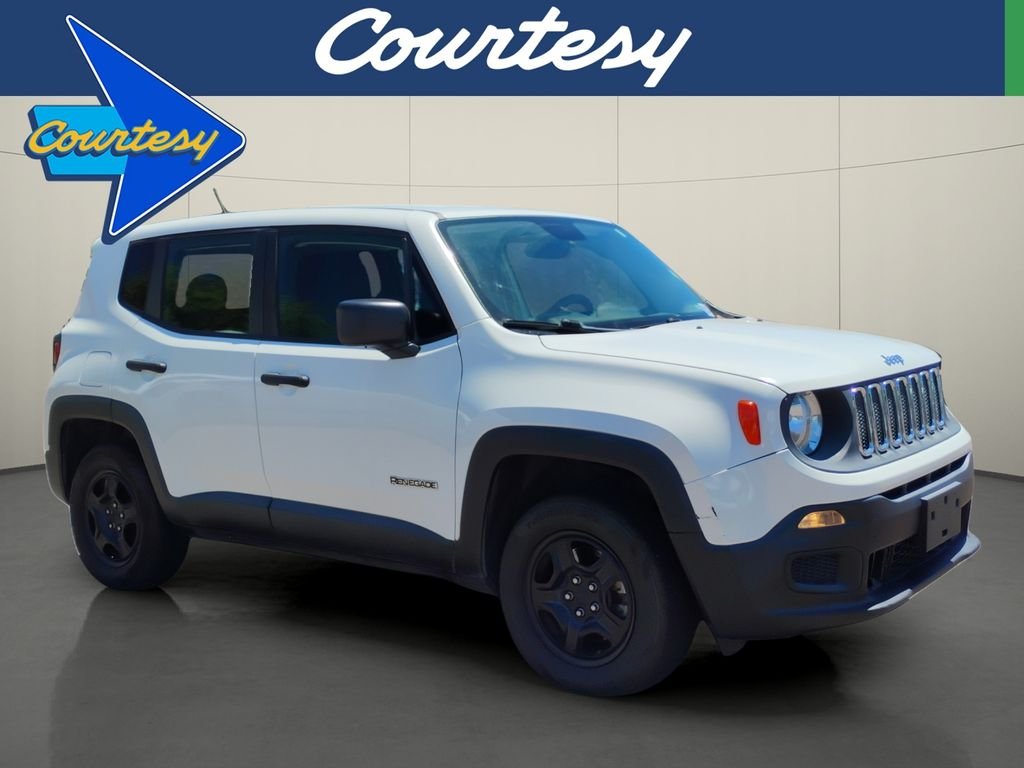 Used 2017 White Jeep Sport image 1