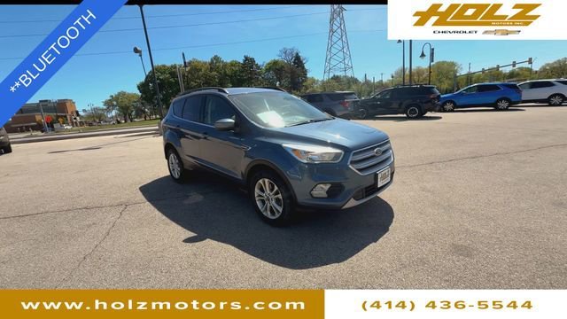 Used 2018 Ford Escape SE with VIN 1FMCU9GD7JUA55422 for sale in Hales Corners, WI