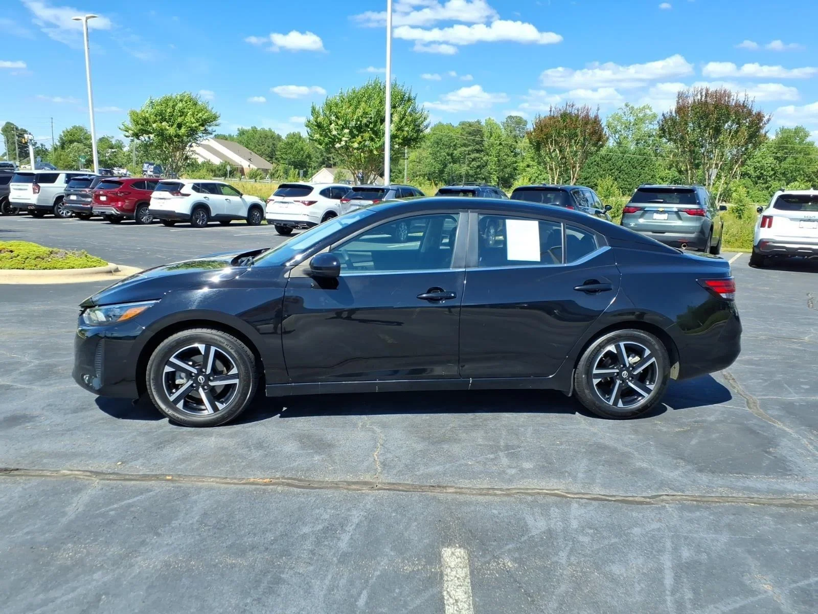 Used 2025 Super Black Nissan SV image 3