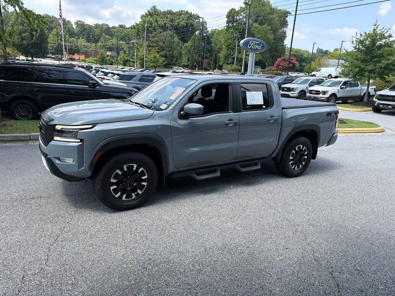 Used 2024 Boulder Gray Pearl Nissan PRO-4X image 2