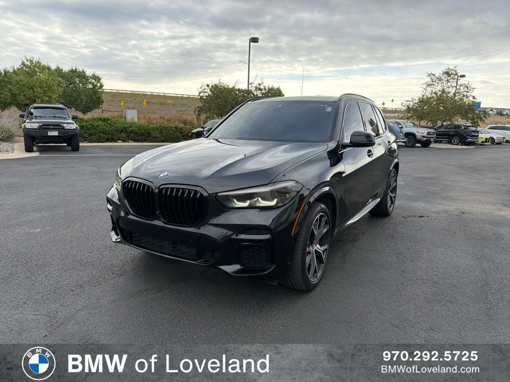 Used 2022 Black Sapphire Metallic BMW xDrive40i image 1