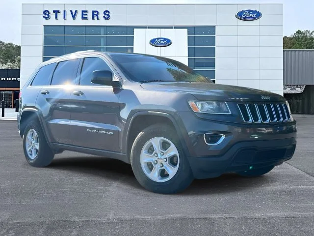Used 2014 Granite Crystal Clearcoat Metallic Jeep Laredo image 1