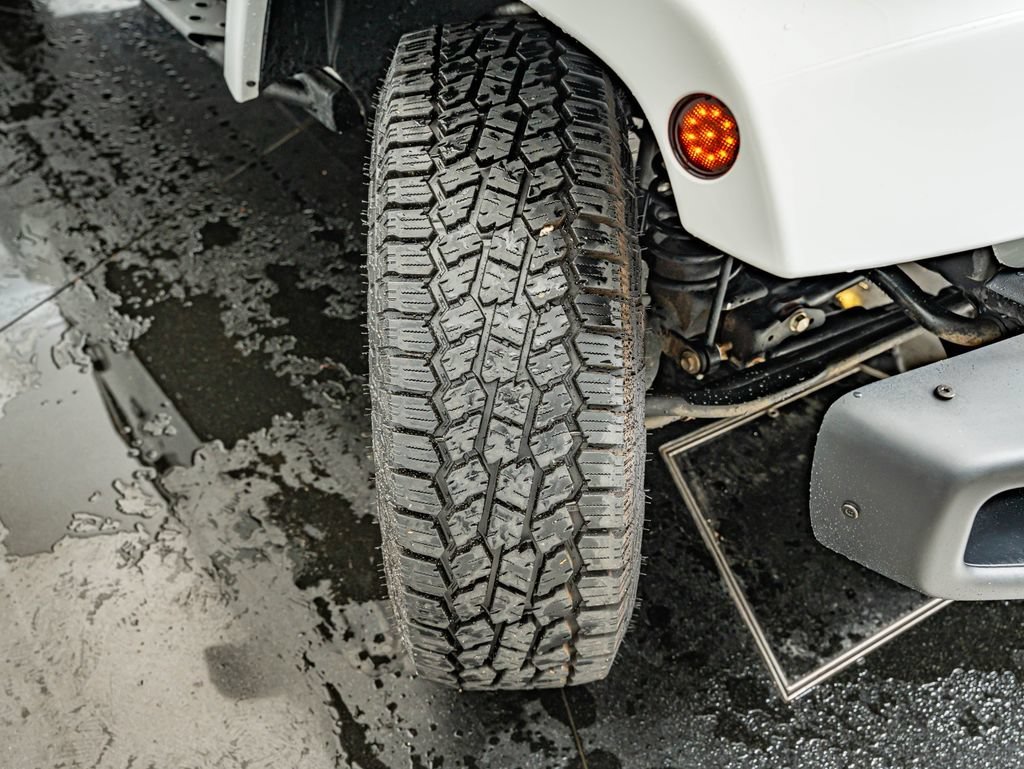 Used 2018 Bright White Clearcoat Jeep Unlimited Sport image 40