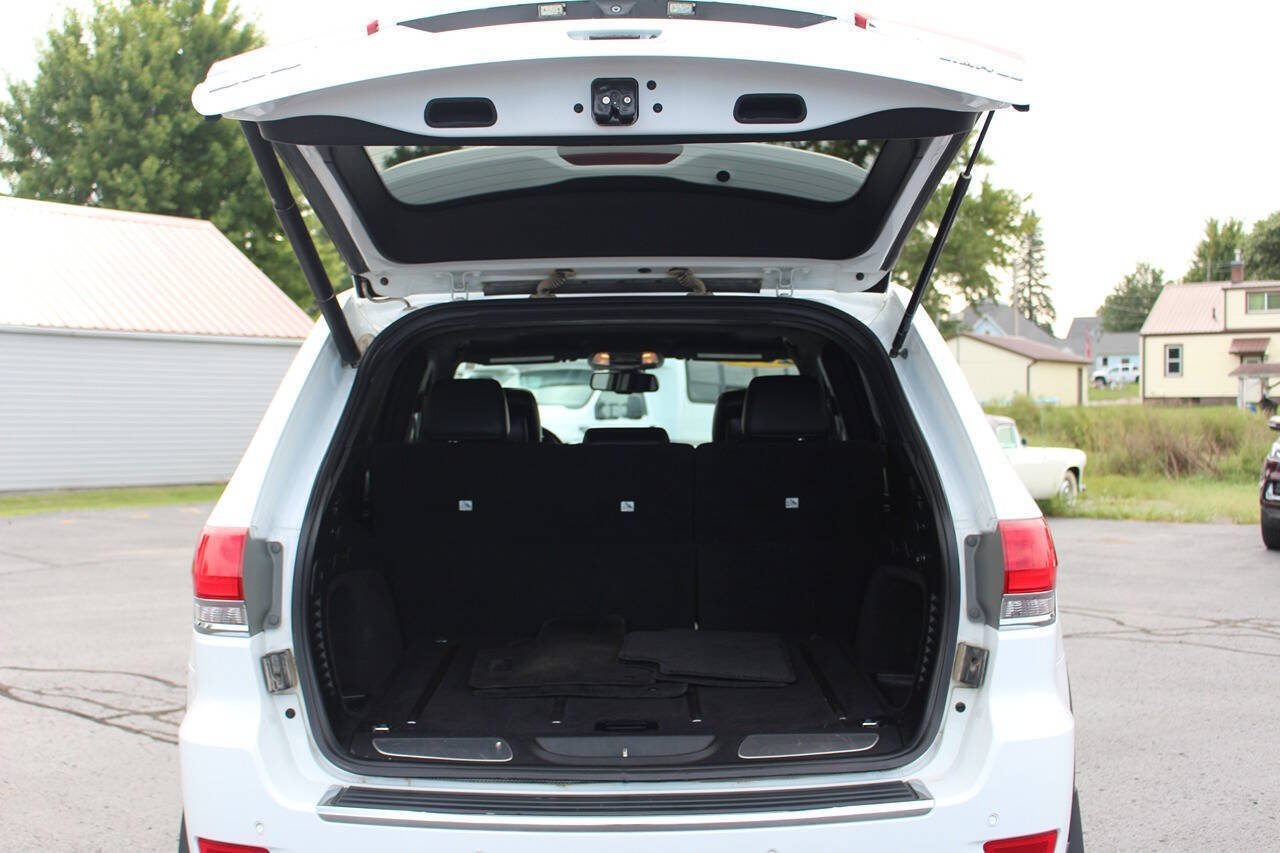 Used 2015 Bright White Clear Coat Jeep Limited 4x4 4dr SUV image 8