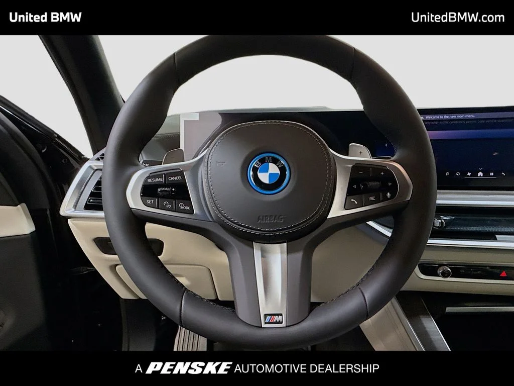 New 2026 Black Sapphire Metallic BMW xDrive50e image 6
