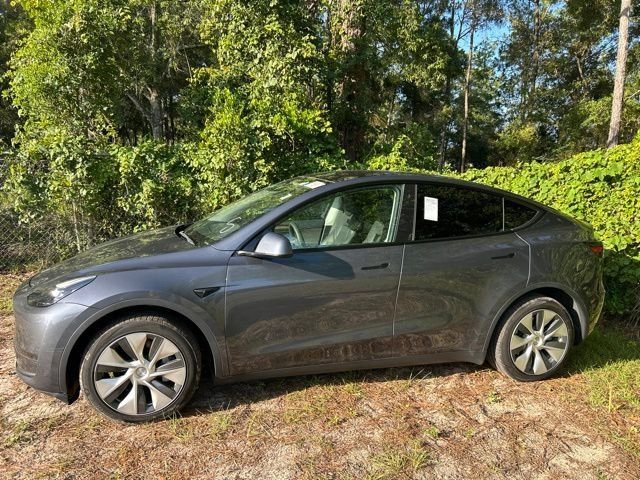 Used 2023 Tesla Model Y Long Range with VIN 7SAYGDEE9PF764888 for sale in Brooksville, FL