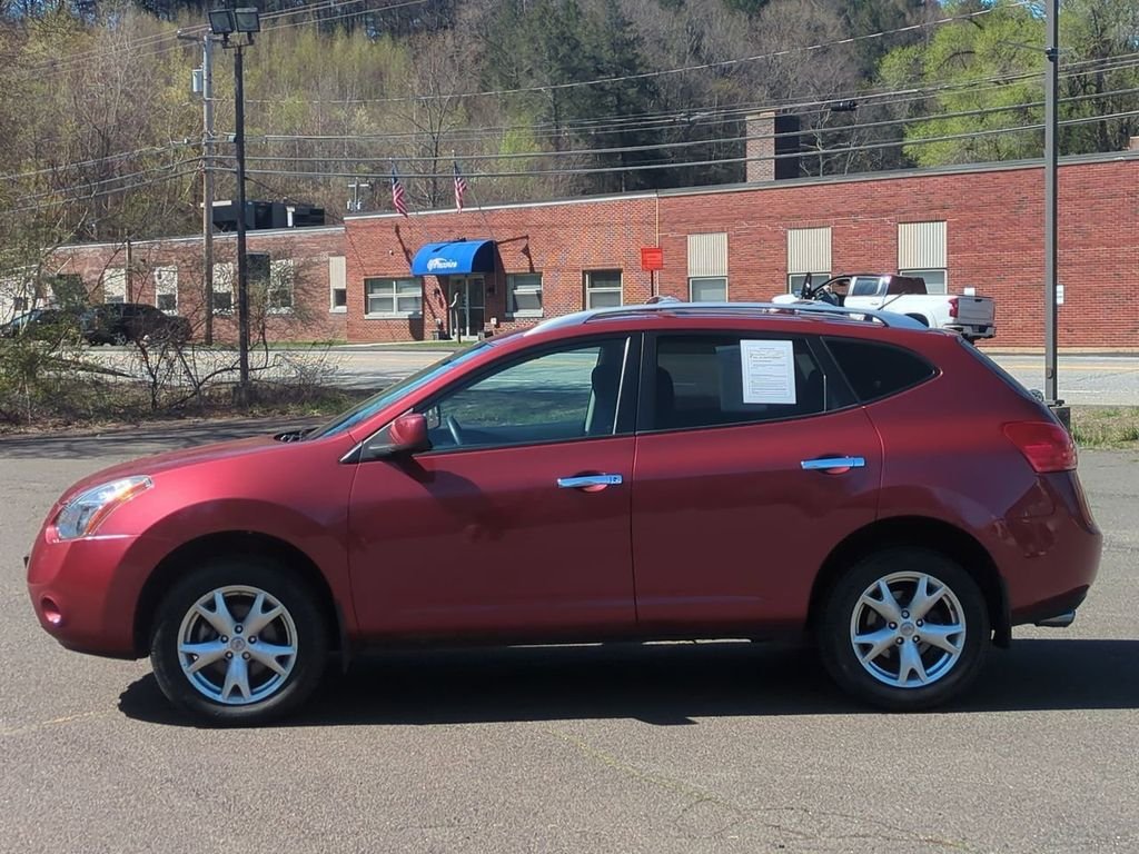 Used 2010 Red Nissan SL image 7