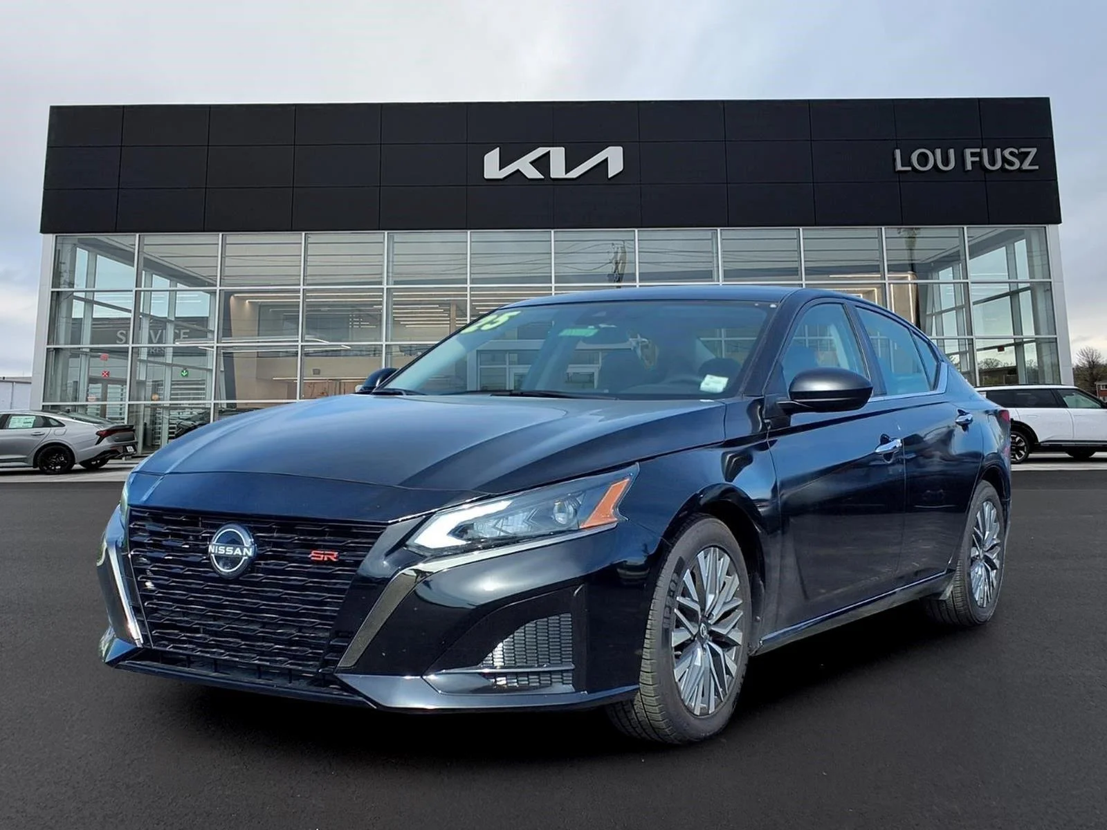 Used 2025 Super Black Nissan SV image 1