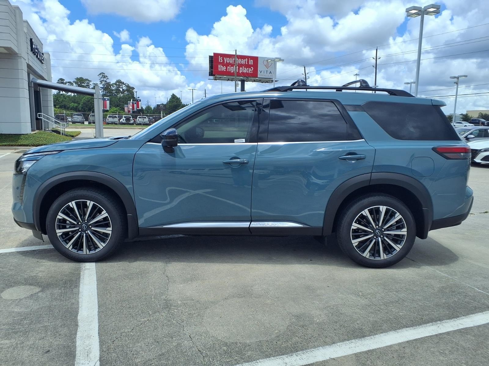 2026 Nissan Pathfinder Platinum Green at Robbins Nissan