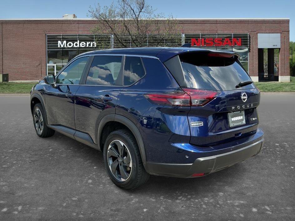 Used 2024 Deep Ocean Blue Pearl Nissan SV image 2