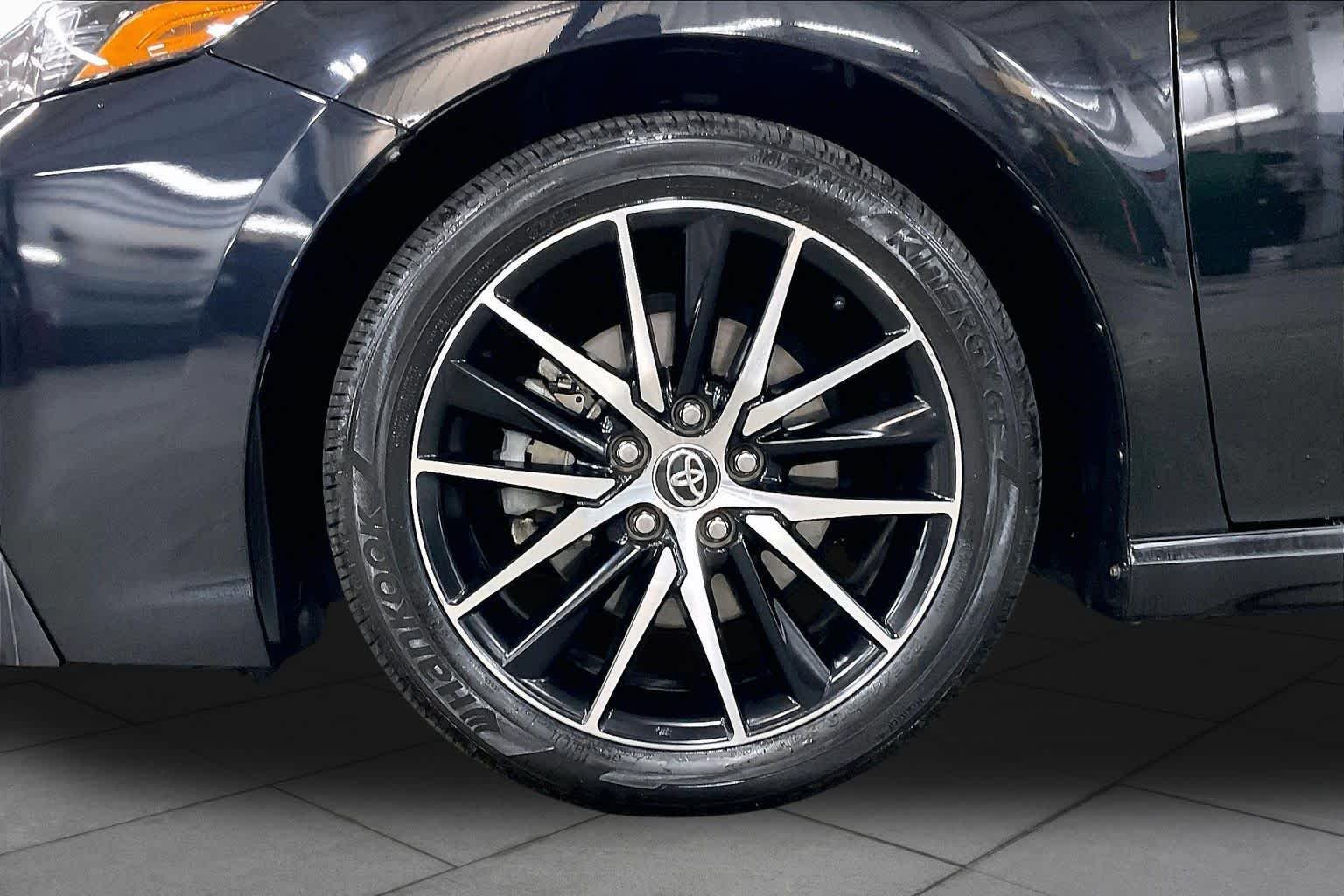 Used 2023 Midnight Black Metallic Toyota SE image 11