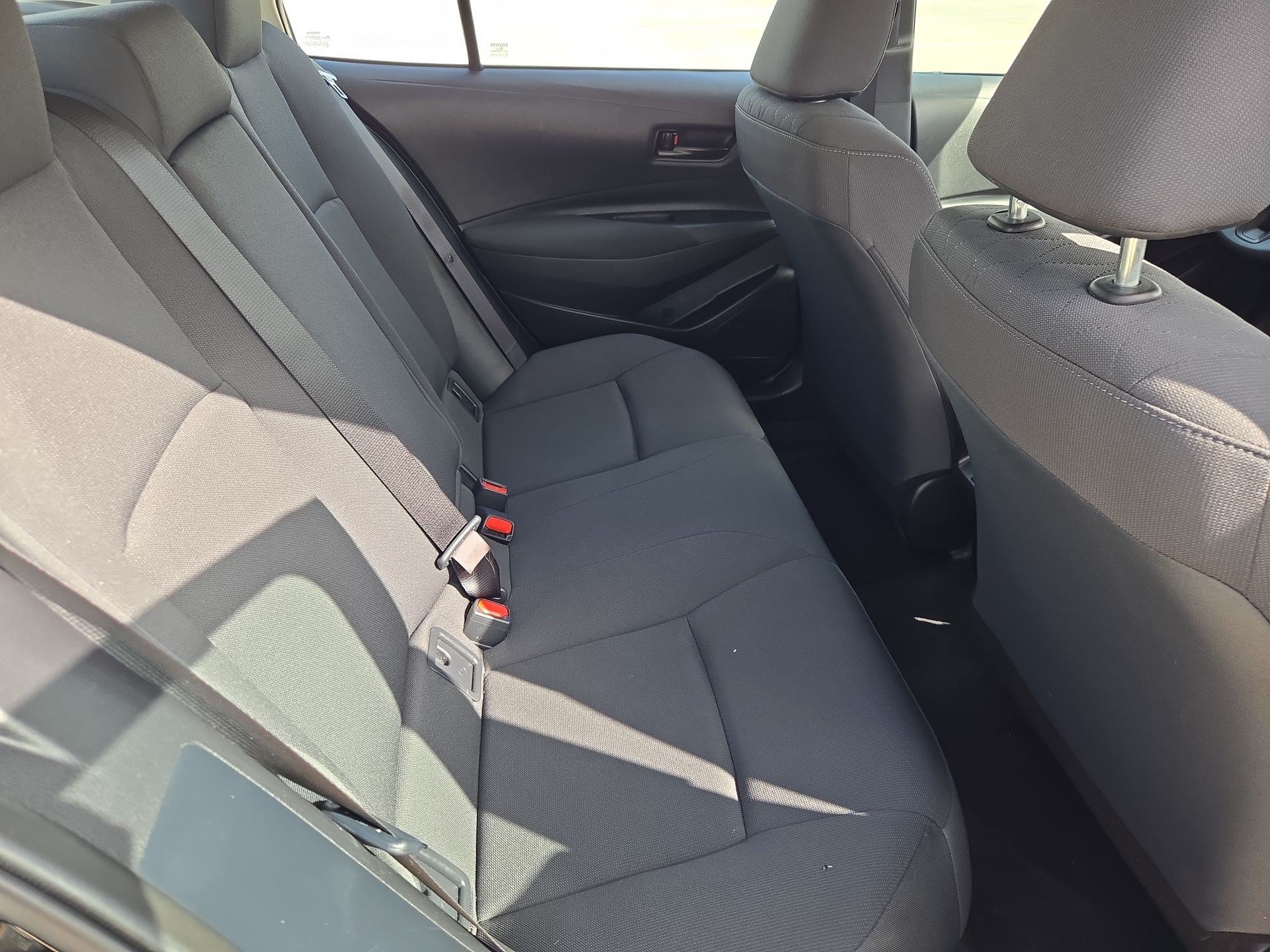 Used 2025 Midnight Black Metallic Toyota LE image 28