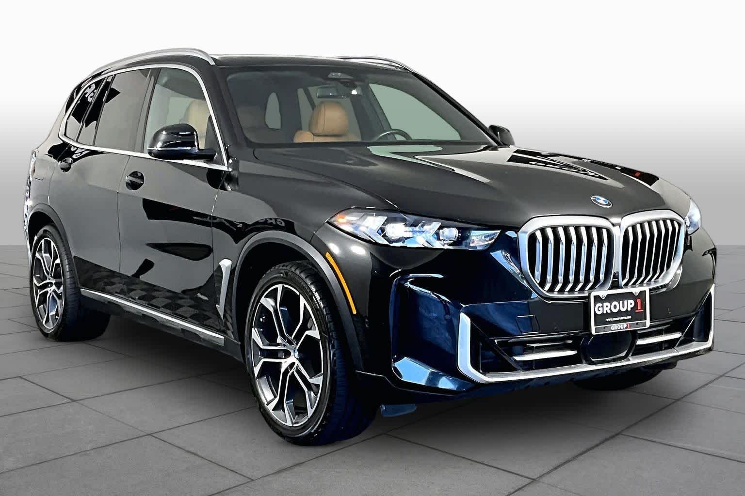 Used 2024 Black Sapphire Metallic BMW sDrive40i image 3