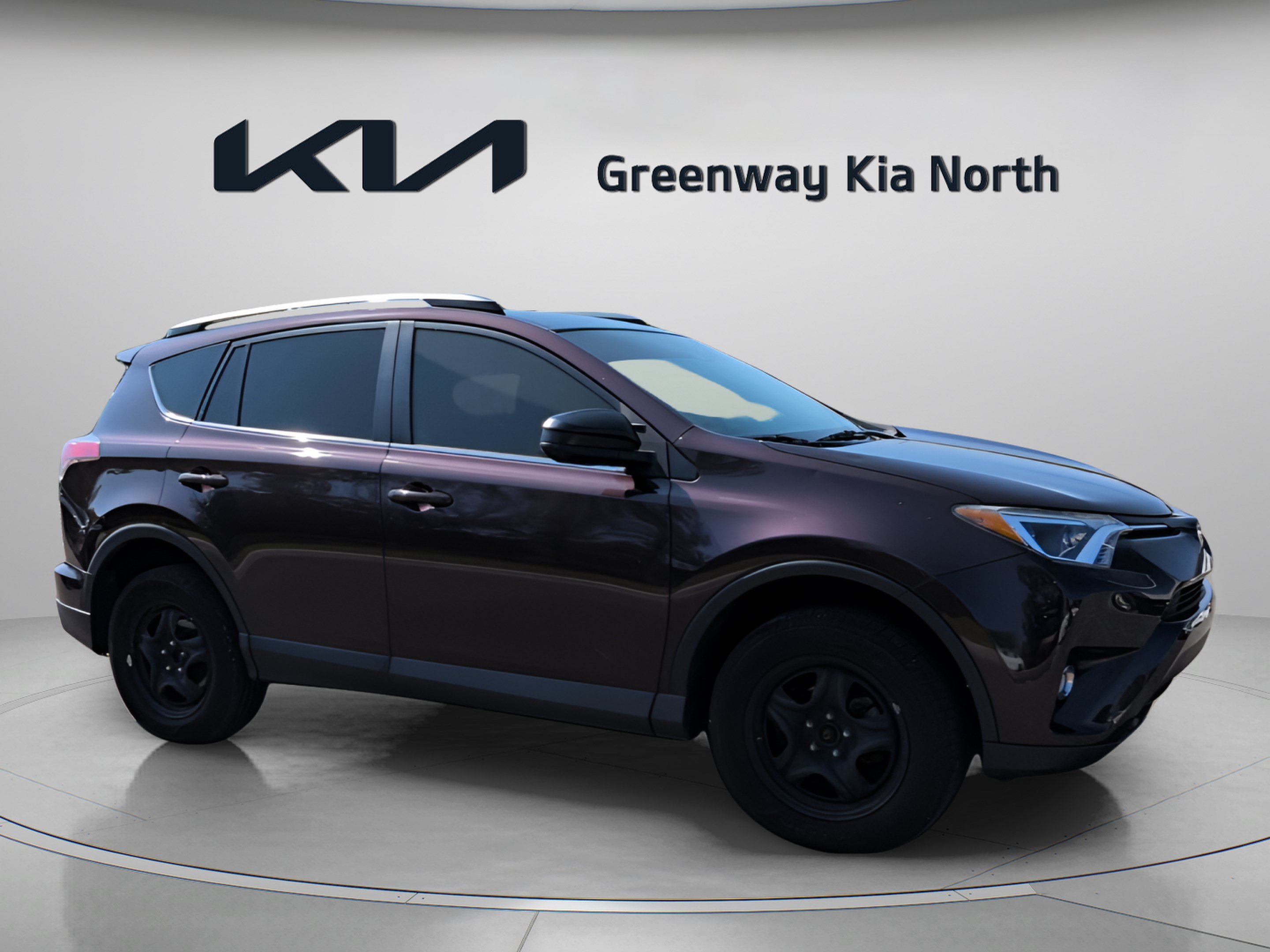 Used 2018 Black Currant Toyota LE image 1