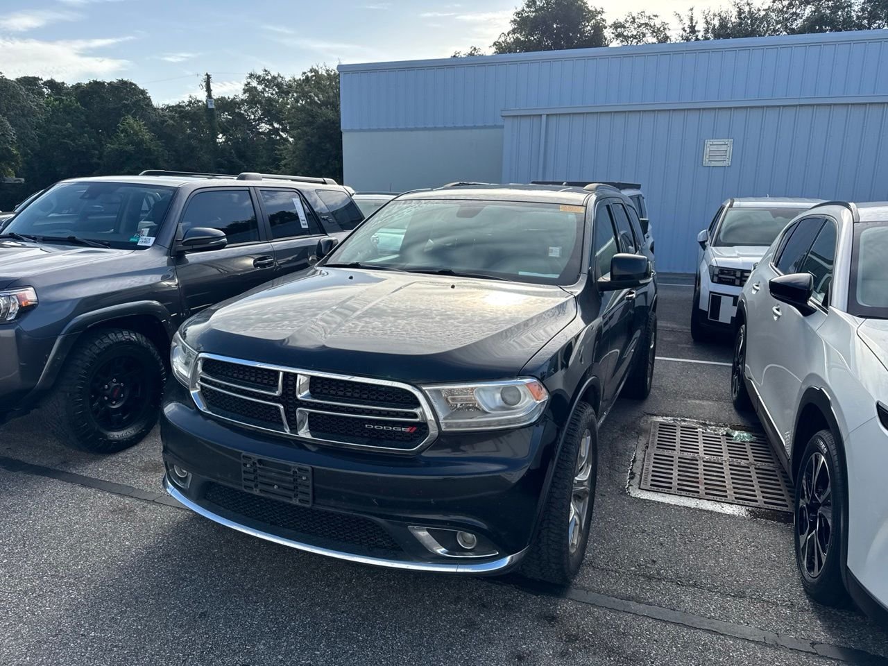 Used 2014 Black Dodge Limited image 1