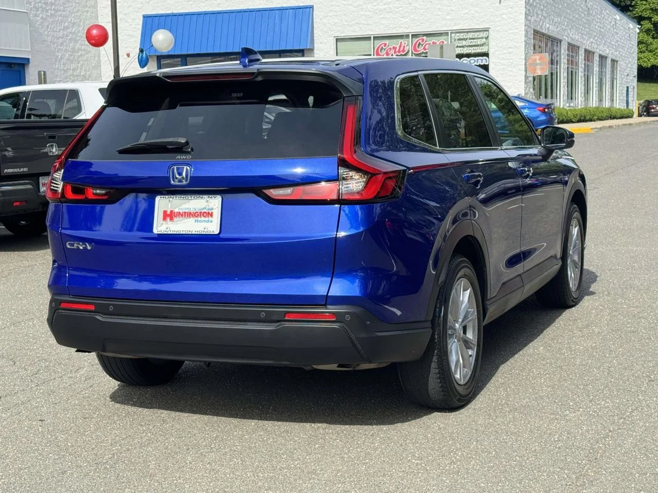 Used 2023 Still Night Pearl Honda EX-L image 5
