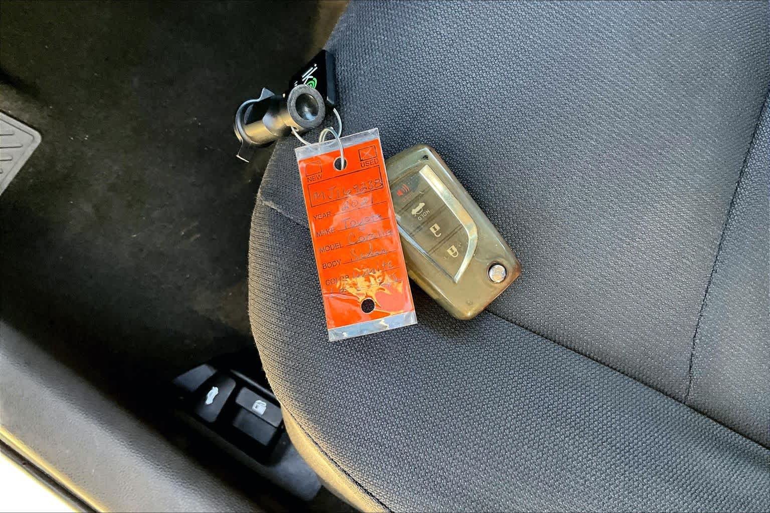 Used 2021 Super White Toyota LE image 15