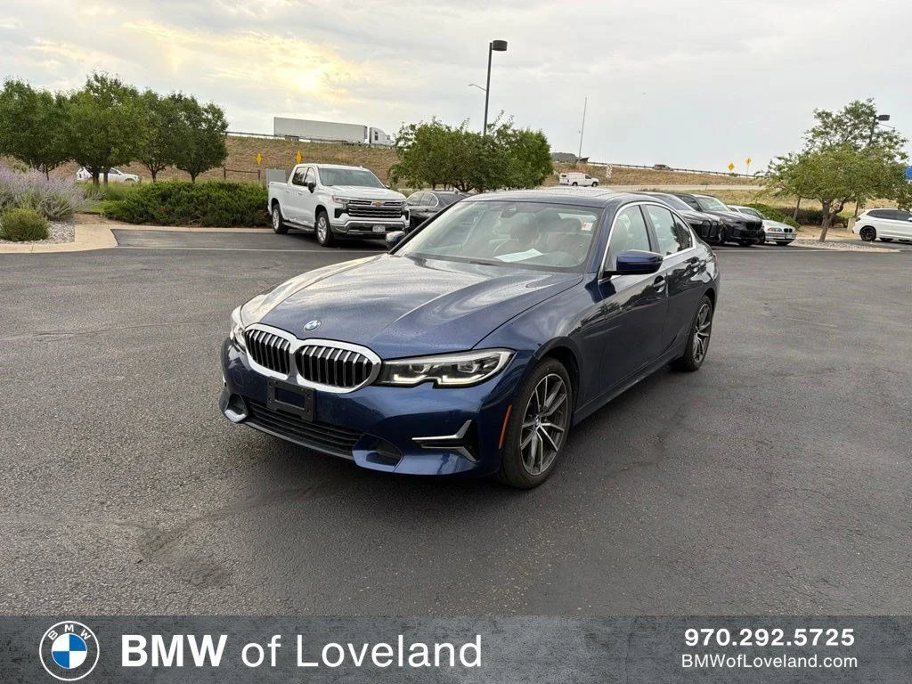 Used 2019 Mediterranean Blue Metallic BMW 330i xDrive image 1