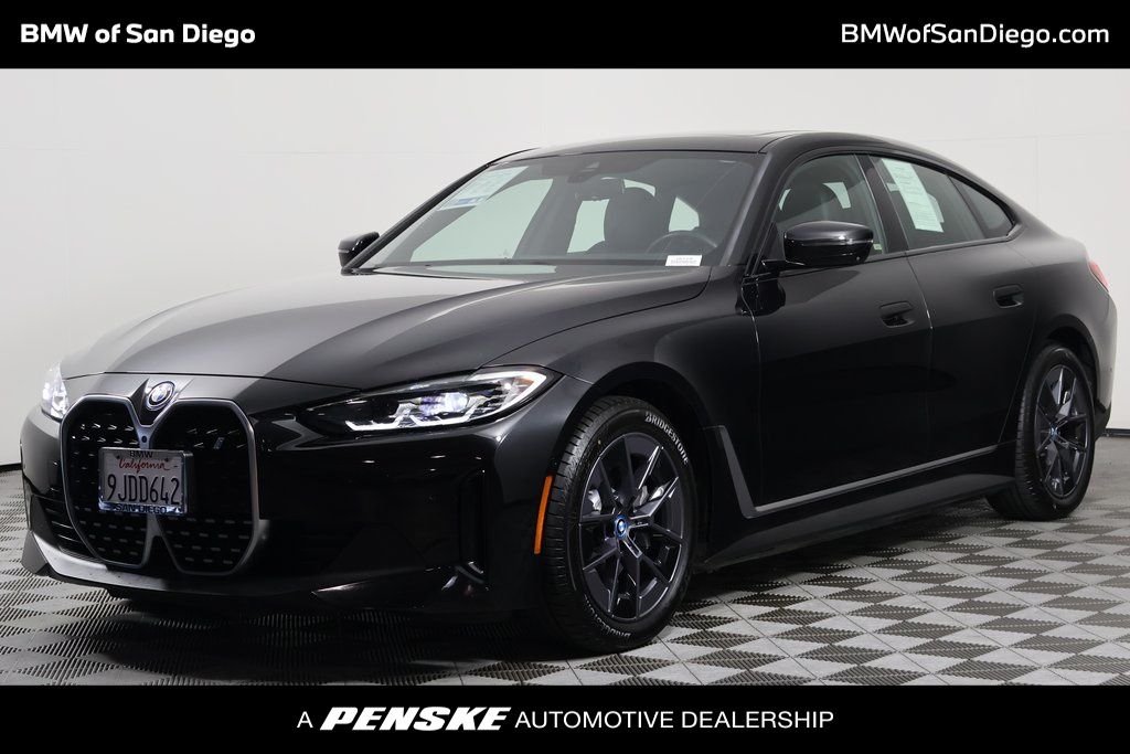 Certified Used 2023 Black Sapphire Metallic BMW eDrive40 image 1