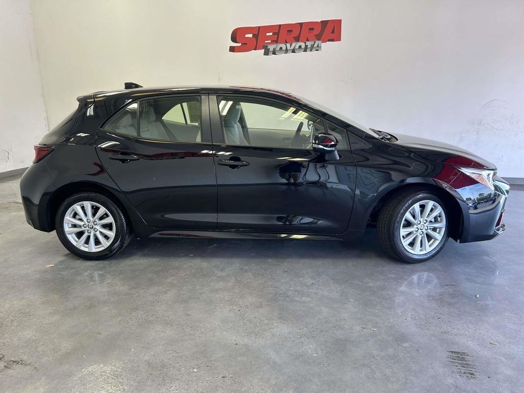 Used 2025 Black Toyota SE image 2