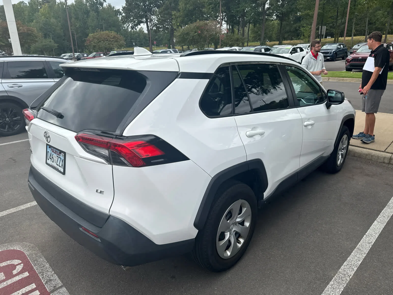 Used 2021 Super White Toyota LE image 4
