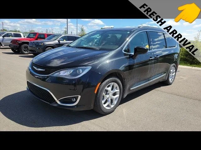 Used 2017 Black Chrysler Touring L image 1